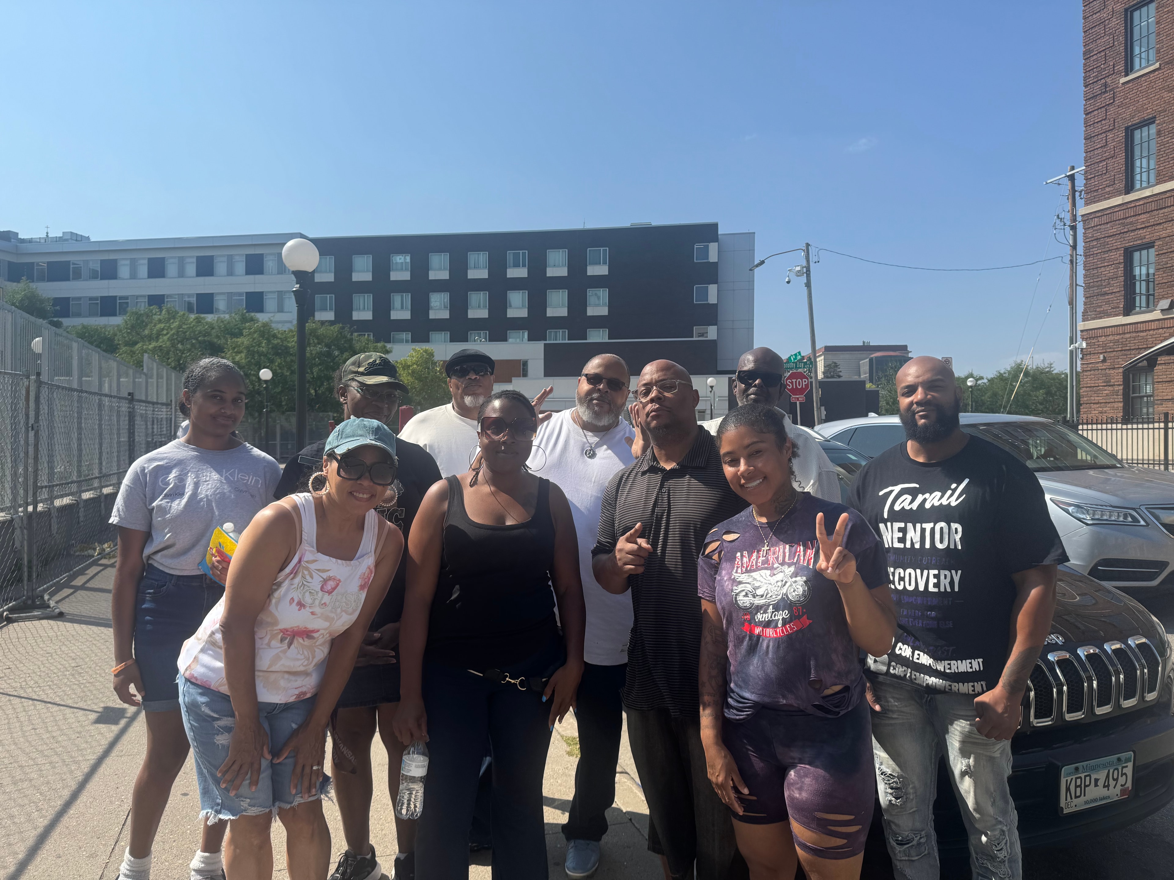 Community members receiving care and supplies at a Threshold to Thrive outreach