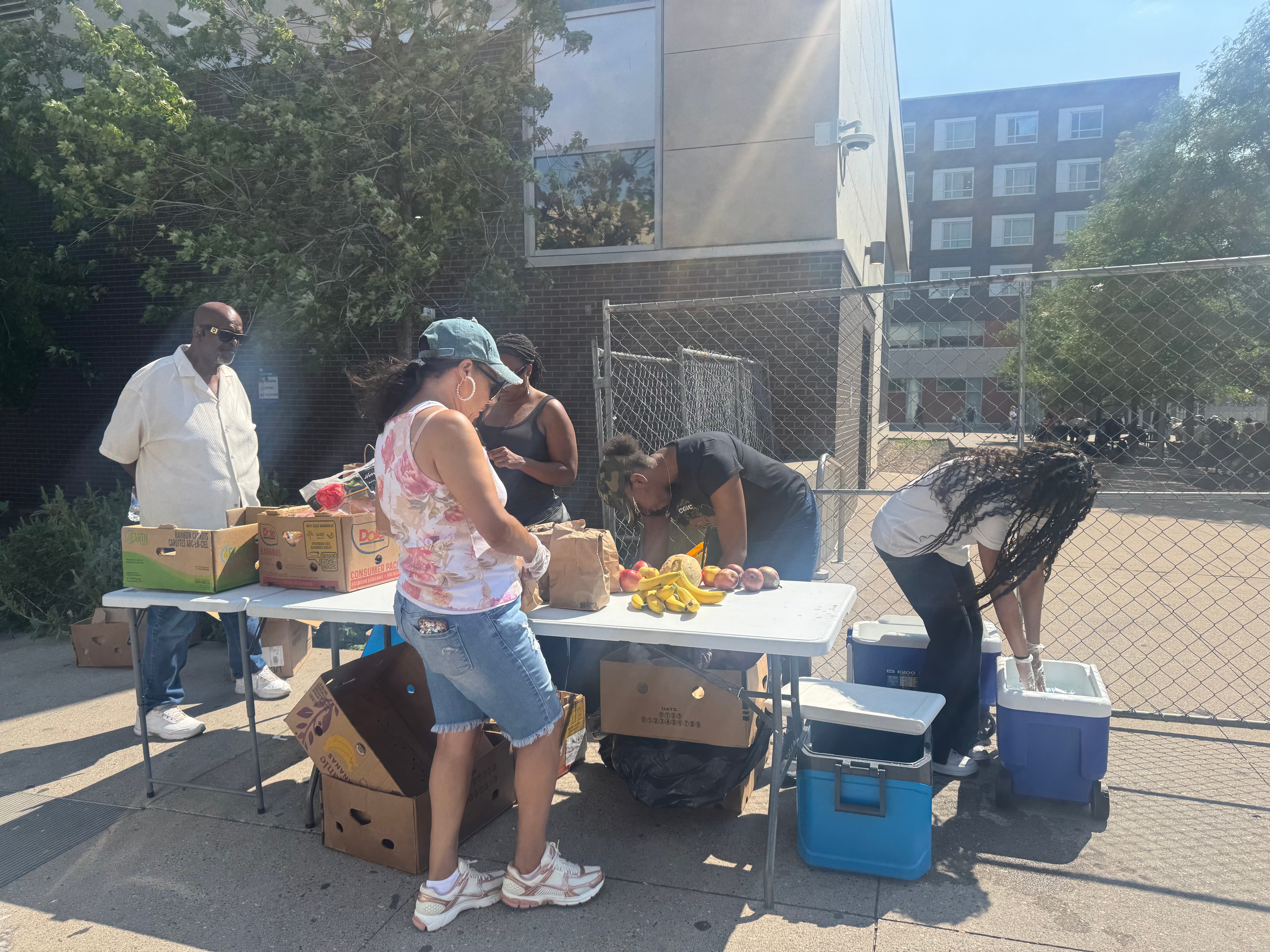 Volunteers and community members coming together at a Threshold to Thrive event